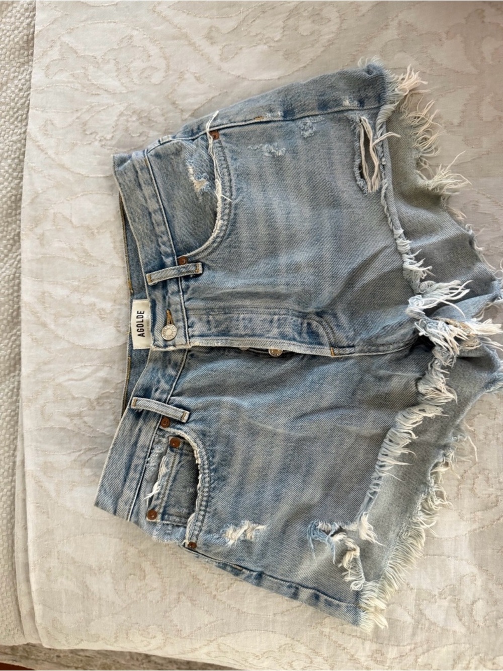 Agolde Light Wash Distressed Denim Cutoff Shorts